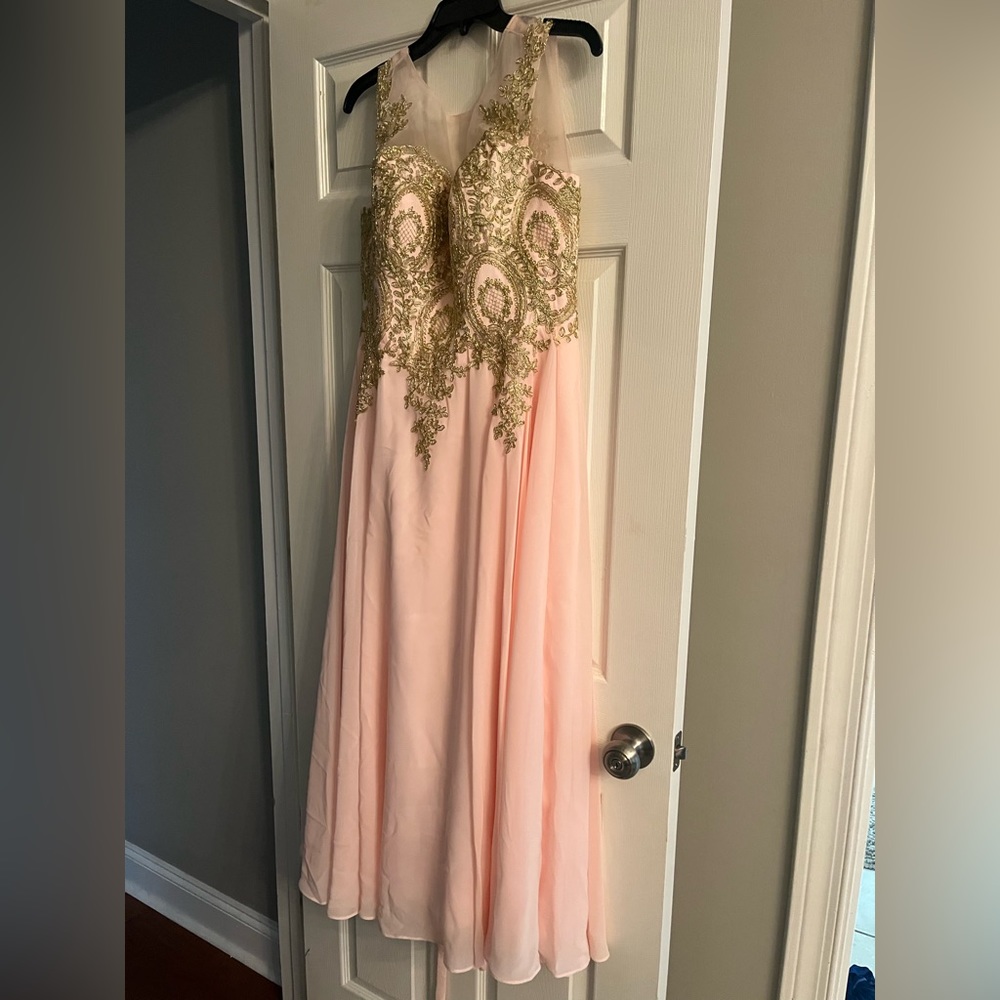 Nice lights pink evening gown. Corset strapped back